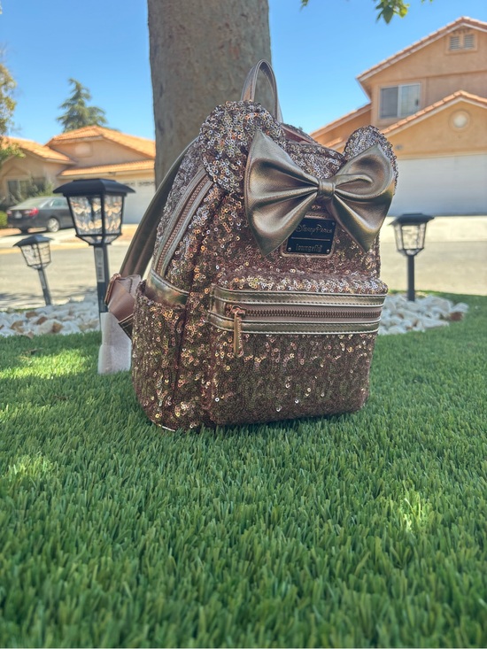 Loungefly Handbags - Loungefly Metallic Rose Gold Sequin Mini Backpack with Bow Accent